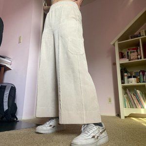 Wide Leg/ Flared Creamed Colored Pants from Urban Outfitters